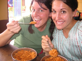 Ali and Lizzy Eating Jollof Rice